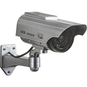 Dummy security camera with solar panel and flashing LED light for deterrence.